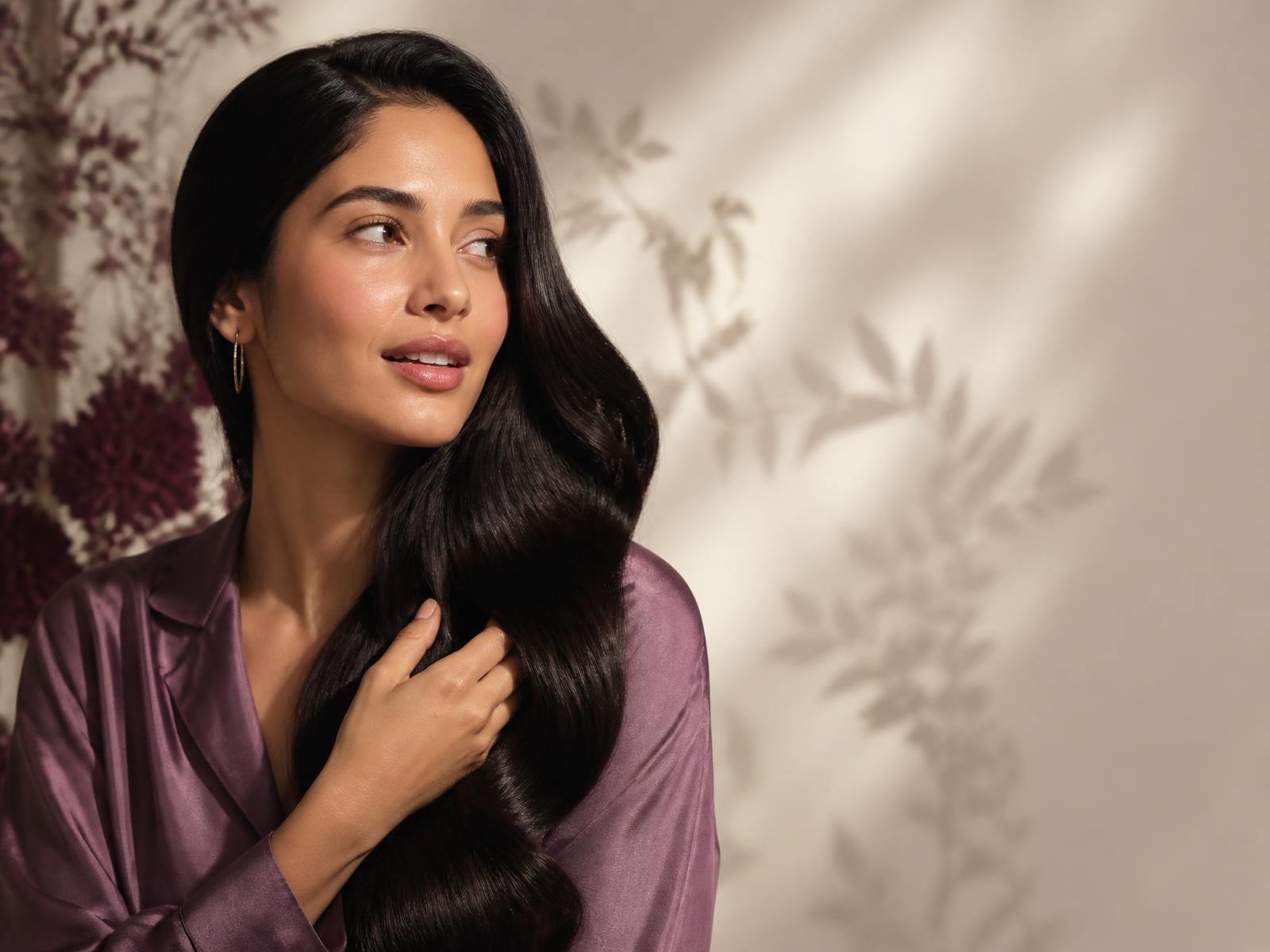 Woman with long, healthy, glossy dark hair